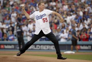 Former Dodger Orel Hershiser throws out the first pitch before Game 5 of the World Series.