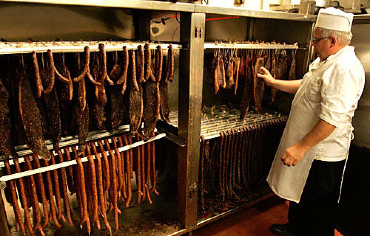 SPACE-SAVER: Before buying the dehydrator, Gary Troub would hang meat all over the kitchen, making walking tricky.