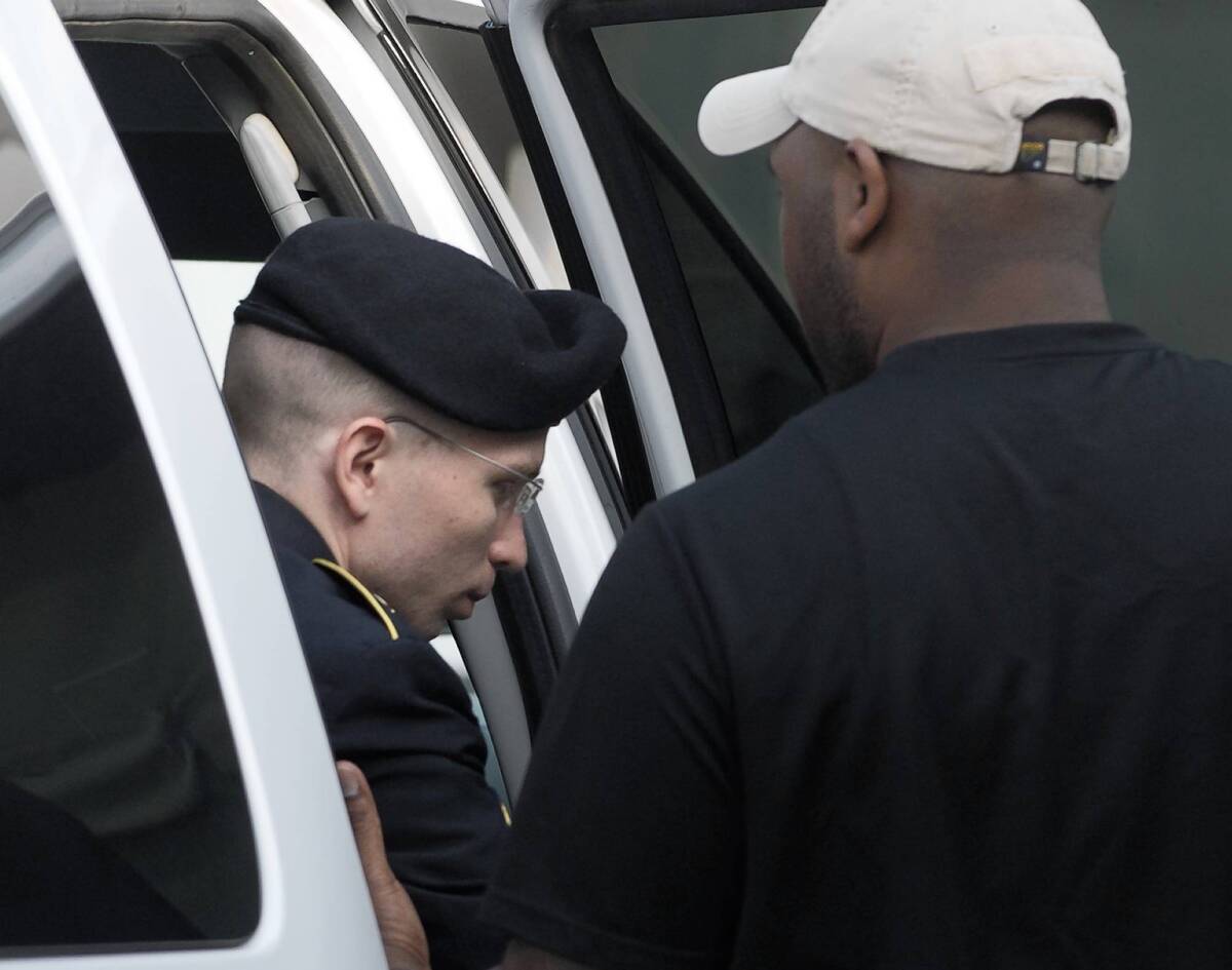 Army Pfc. Bradley Manning arrives at court at Ft. Meade, Md., for the first day of the sentencing phase of his court-martial. He could face up to 136 years in prison for violating the Espionage Act.