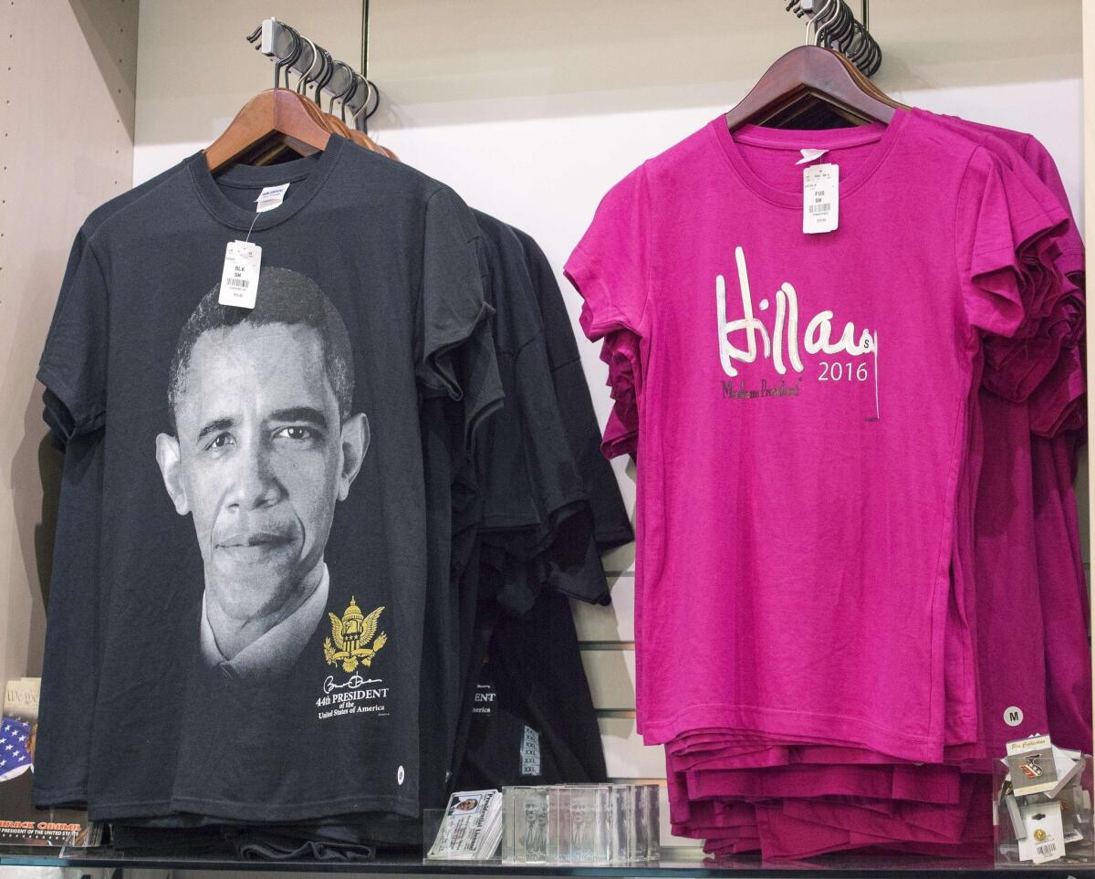 T-shirts with an image of President Barack Obama and the name of Democratic Presidential hopeful Hillary Clinton are for sale in a gift shop at Ronald Reagan National Airport in Washington on June 8.