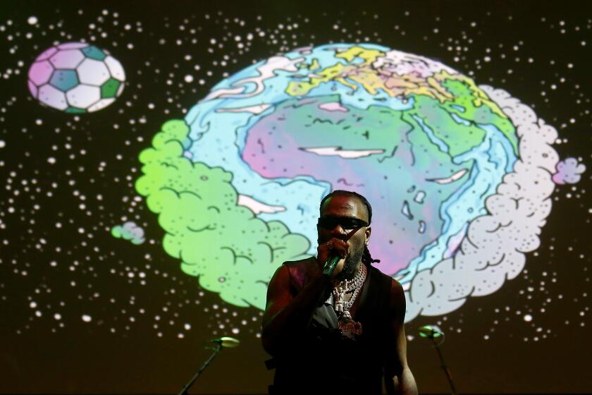 LOS ANGELES, CALIF. - AUG. 29, 2019. Nigerian Afro-fusion singer and songwriter Burna Boy performs at the Wiltern Theater in Los Angeles on Thursday night, Aug. 29, 2019. (Luis Sinco/Los Angeles Times)