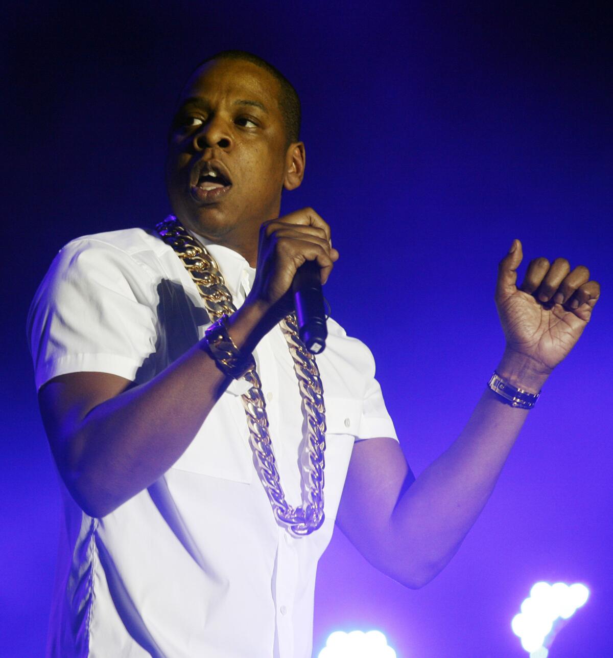 Jay Z, seen performing at the Wireless Festival in London over the summer, has teamed with Barneys on its holiday collection.