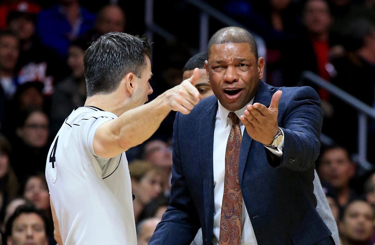 Clippers Coach Doc Rivers pleads for a foul call from official Eli Roe during the fourth quarter of a game on Dec. 17.