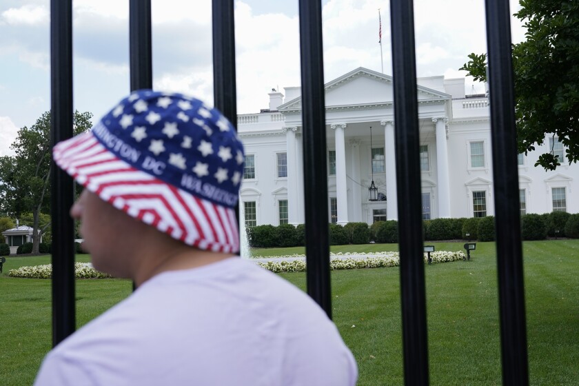 FILE - The North Lawn of the White House is seen from a newly reopened section of Pennsylvania Avenue, July 4, 2021, in Washington. The White House has announced they will resume a full operating schedule for public tours beginning July 19, 2022. (AP Photo/Patrick Semansky, File)