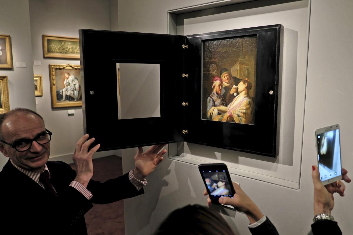 Gallery owner Bertrand Gautier displays Rembrandt's "The Unconscious Patient (An Allegory of Smell)" in March in Maastricht, the Netherlands