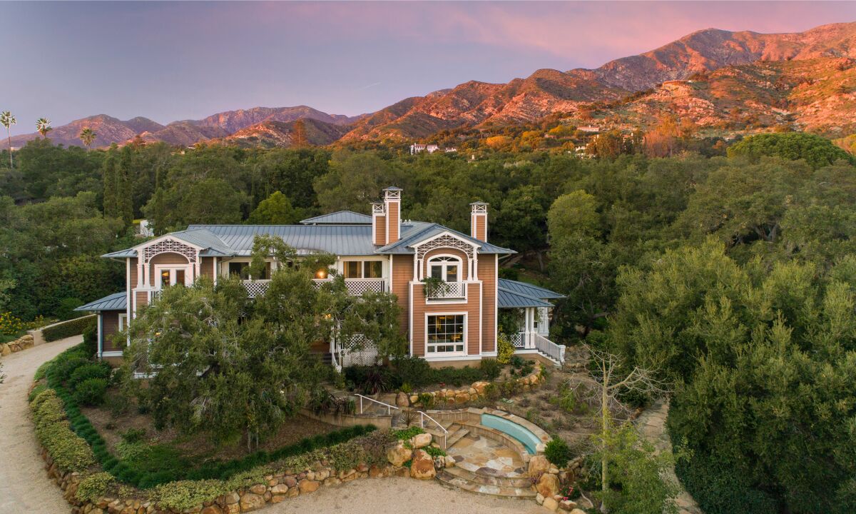 Spanning two acres in the hills of Montecito, the property features a two-story home with lots of outdoor entertaining spaces and a three-car garage with a guesthouse up top.