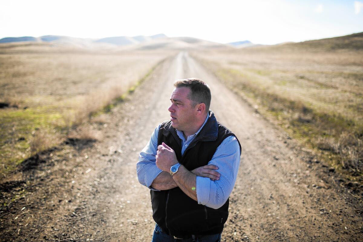Jeff Sutton, general manager of the Tehama Colusa Canal Authority, stands in the valley that would be inundated by the proposed Sites Reservoir near Maxwell, Calif.