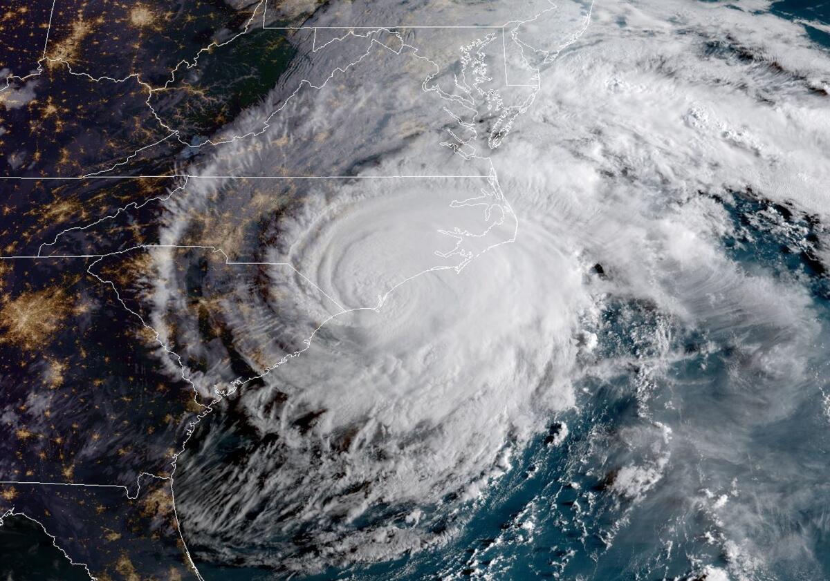 This NOAA/RAMMB satellite image taken at 12:00 UTC on September 14, 2018, shows Hurricane Florence making landfall on US east coast. - Florence smashed into the US East Coast Friday with howling winds, torrential rains and life-threatening storm surges as emergency crews scrambled to rescue hundreds of people stranded in their homes by flood waters. Forecasters warned of catastrophic flooding and other mayhem from the monster storm, which is only Category 1 but physically sprawling and dangerous. (Photo by HO / NOAA/RAMMB / AFP) / RESTRICTED TO EDITORIAL USE - MANDATORY CREDIT "AFP PHOTO / NOAA/RAMMB" - NO MARKETING NO ADVERTISING CAMPAIGNS - DISTRIBUTED AS A SERVICE TO CLIENTSHO/AFP/Getty Images ** OUTS - ELSENT, FPG, CM - OUTS * NM, PH, VA if sourced by CT, LA or MoD **