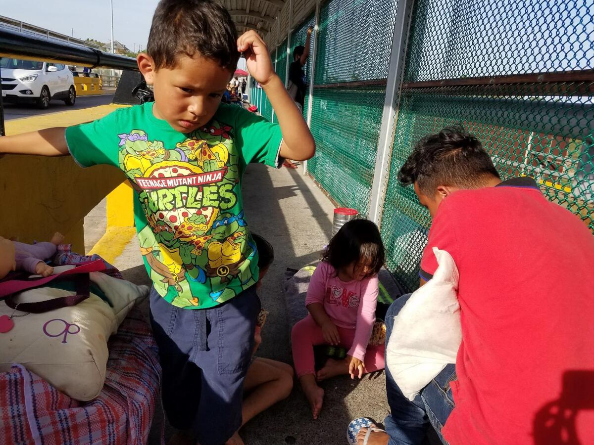 Those seeking asylum say they presented their documents to U.S. Customs officials on the bridge. But the officials said the families have to wait on the Mexican side of the bridge.