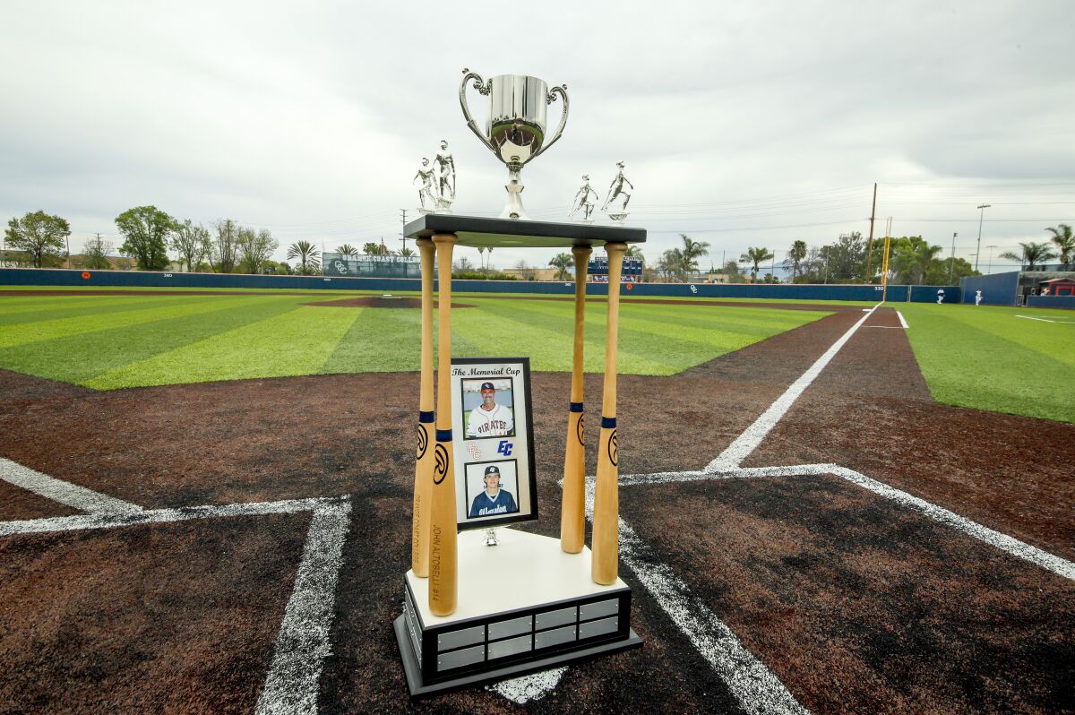 The Memorial Cup, awarded to the winner of a series between Orange Coast College and El Camino College, is pictured.