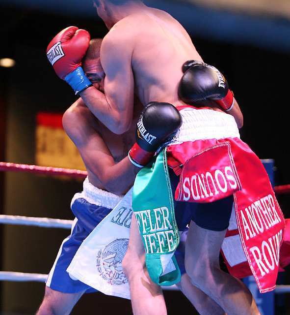 Oscar Andrade wears the Mexican flag colors for his trunks in his bout with Manuel Delcid during Fight Club OC.