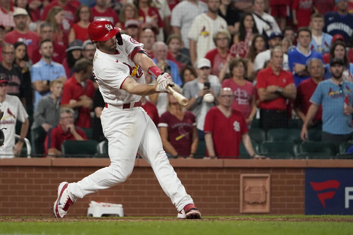 St. Louis Cardinals' Paul Goldschmidt hits a walk-off single during the ninth inning of a baseball game to defeat the Chicago Cubs Friday, Oct. 1, 2021, in St. Louis. (AP Photo/Jeff Roberson)