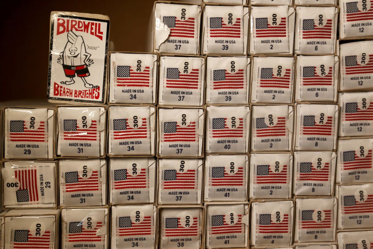 Made in USA tags to be sewn into shorts, shirts and jackets at Birdwell, a surfwear company founded in 1961 that makes its goods in Santa Ana.
