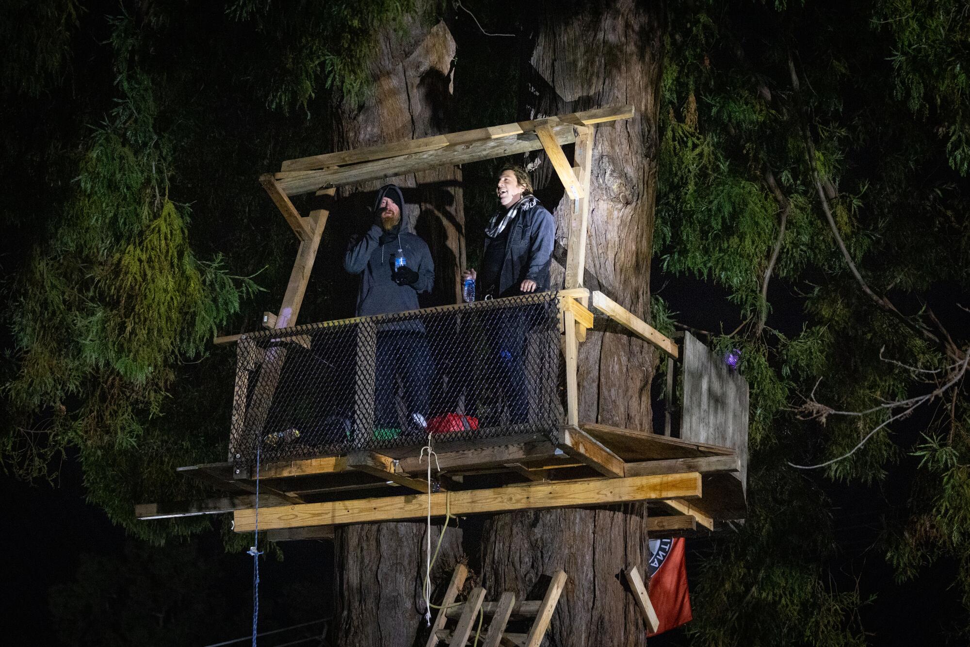 Activists refused to come down from a treehouse as authorities clear People's Park.