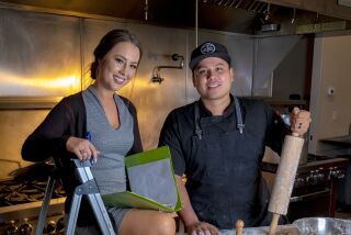 Chef Brett Dudley of Pure Meal Prep San Diego with his co-owner and wife, Cassie Dudley.
