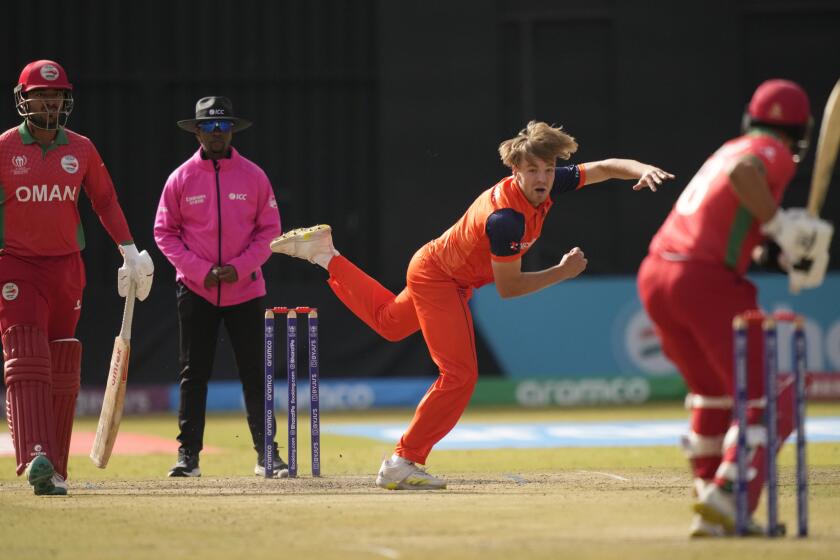 FILE - Netherlands bowler Bas de Leede in action during the ICC Men's Cricket World Cup Qualifier match against Oman at Harare Sports Club in Harare, Zimbabwe, Monday, July 3, 2023. The Cricket World Cup will be staged in India from Oct. 5 until the final on Nov. 19. The Associated Press takes a look at five players to watch during the 6 1/2-week tournament: Babar Azam of Pakistan, Australia's Mitchell Starc, Shakib Al Hasan of Bangladesh, India's Virat Kohli and de Leede of the Netherlands. (AP Photo/Tsvangirayi Mukwazhi, File)