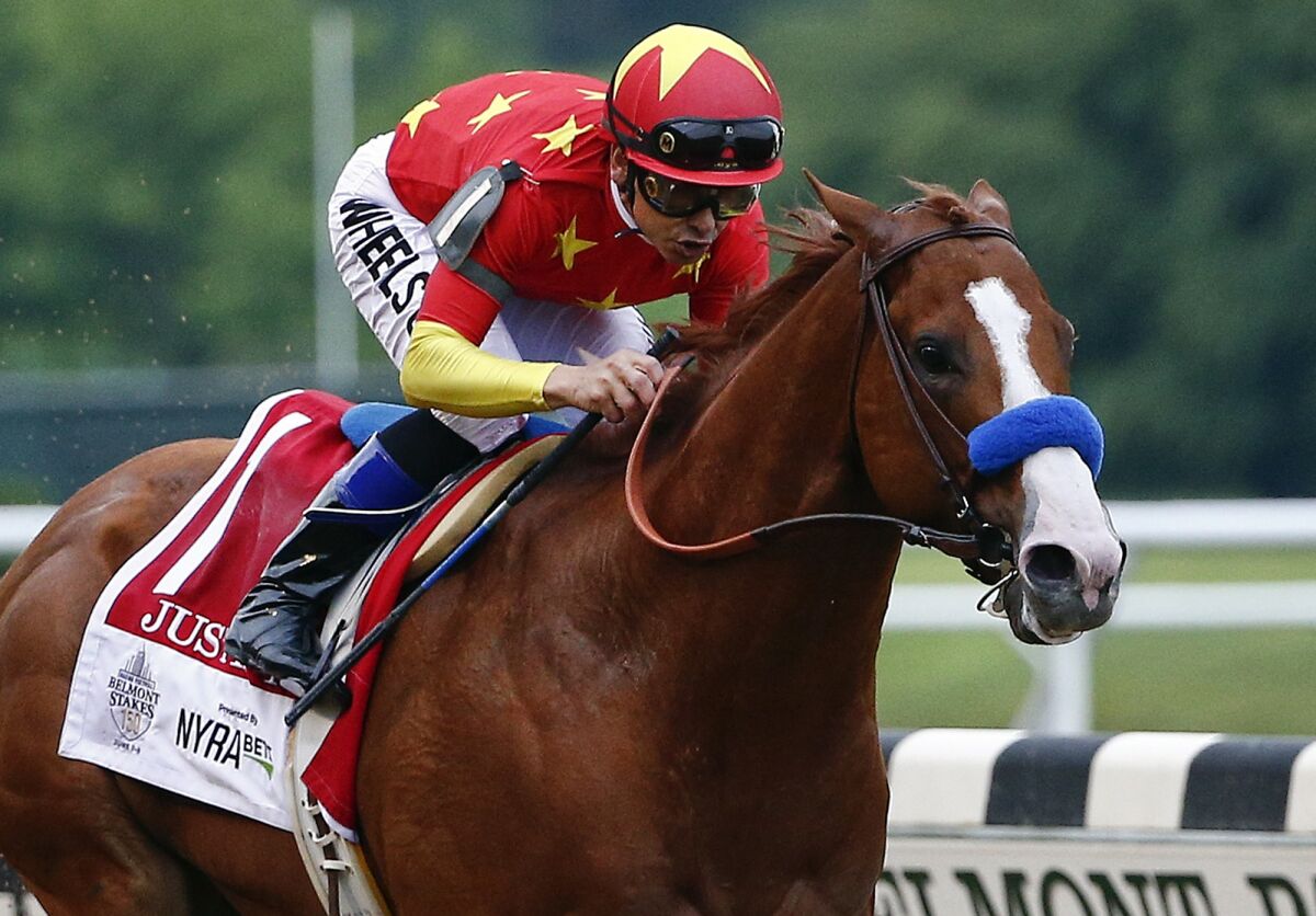 Justify, ridden by Mike Smith, won the 2018 Triple Crown. Smith will ride Art Collector in the Nov. 6 Breeders' Cup Classic.
