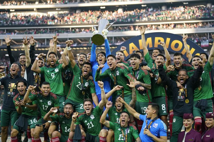Mexico players celebrate lift the CONCACAF Gold Cup trophy and celebrate their win over Panama