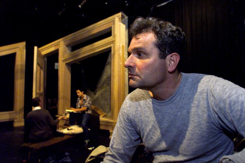 Denis Johnson, author and playwright, helps to stage his play "Hellhounds on My Trail" at Intersection for the Arts in 2001.