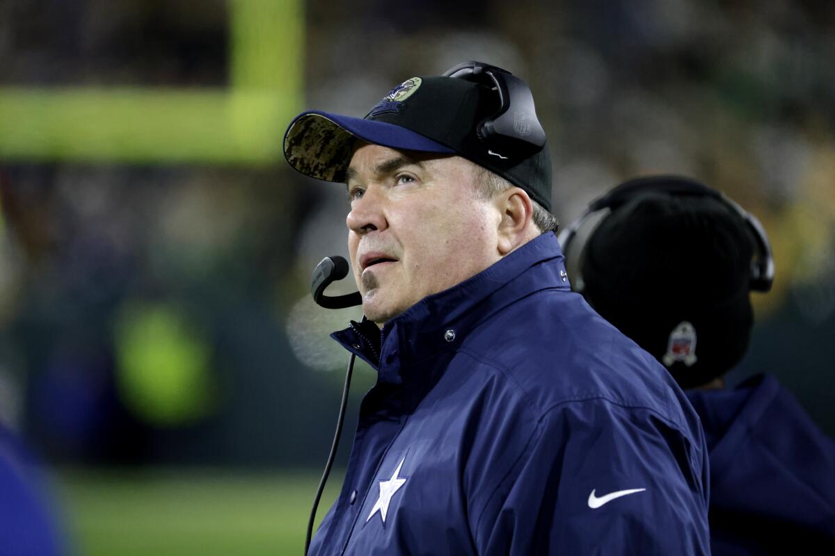 Dallas Cowboys head coach Mike McCarthy watches play from the sideline during the second half of an NFL football game against the Green Bay Packers Sunday, Nov. 13, 2022, in Green Bay, Wis. (AP Photo/Mike Roemer)