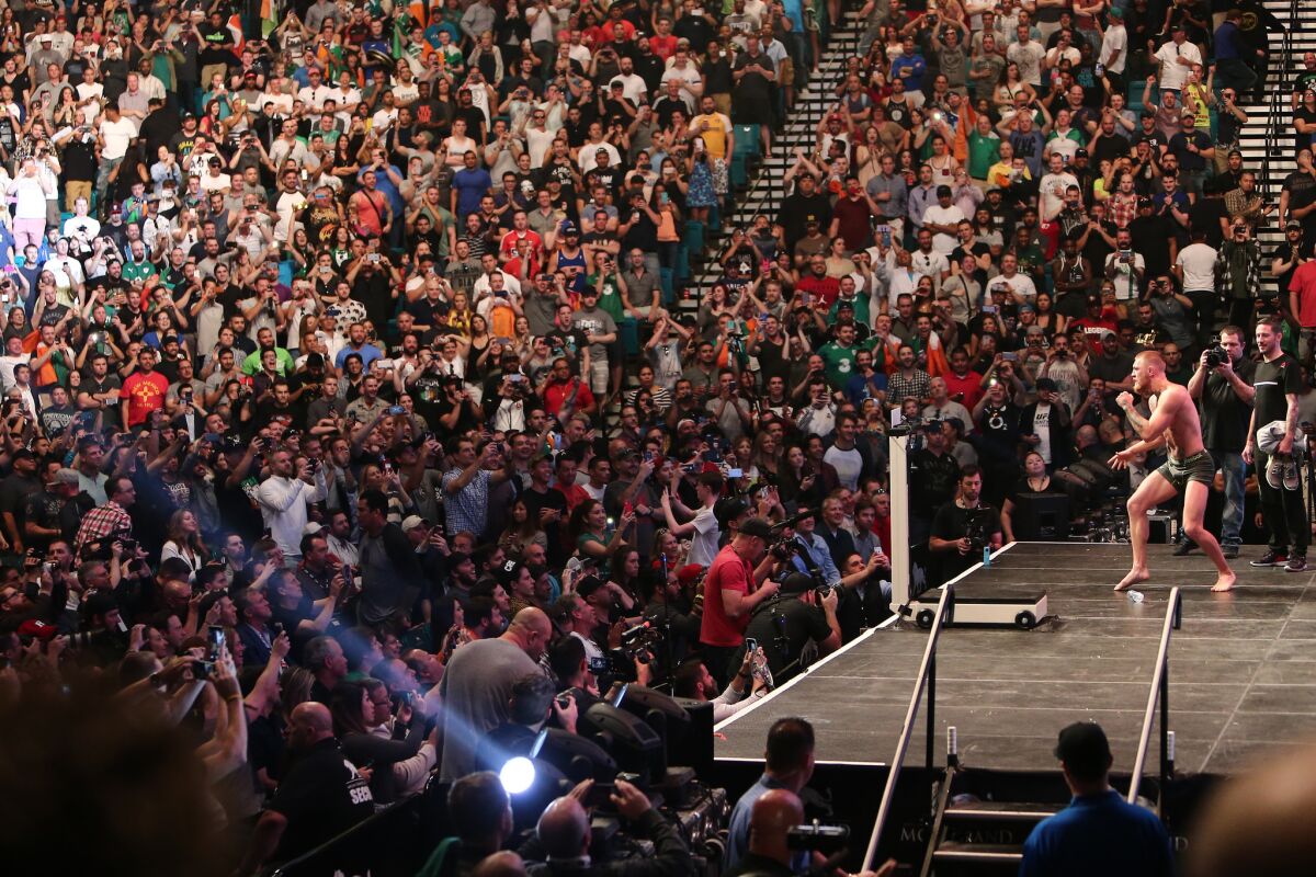 Conor McGregor entertains the fans during the UFC 196 weigh-in on Friday in Las Vegas.
