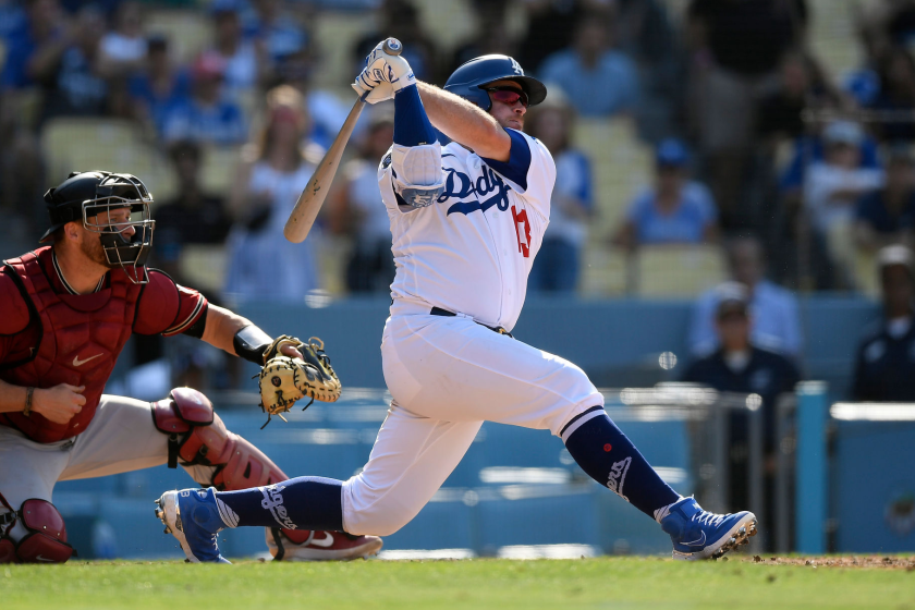 LOS ANGELES, CA - JULY 11: Max Muncy #13 of the Los Angeles Dodgers hits a walk-off, three-run home run.