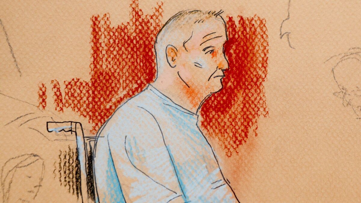 This courtroom sketch depicts Robert Gregory Bowers, who was wounded in a gun battle with police, as he appeared in a wheelchair at federal court Oct. 29 in Pittsburgh.