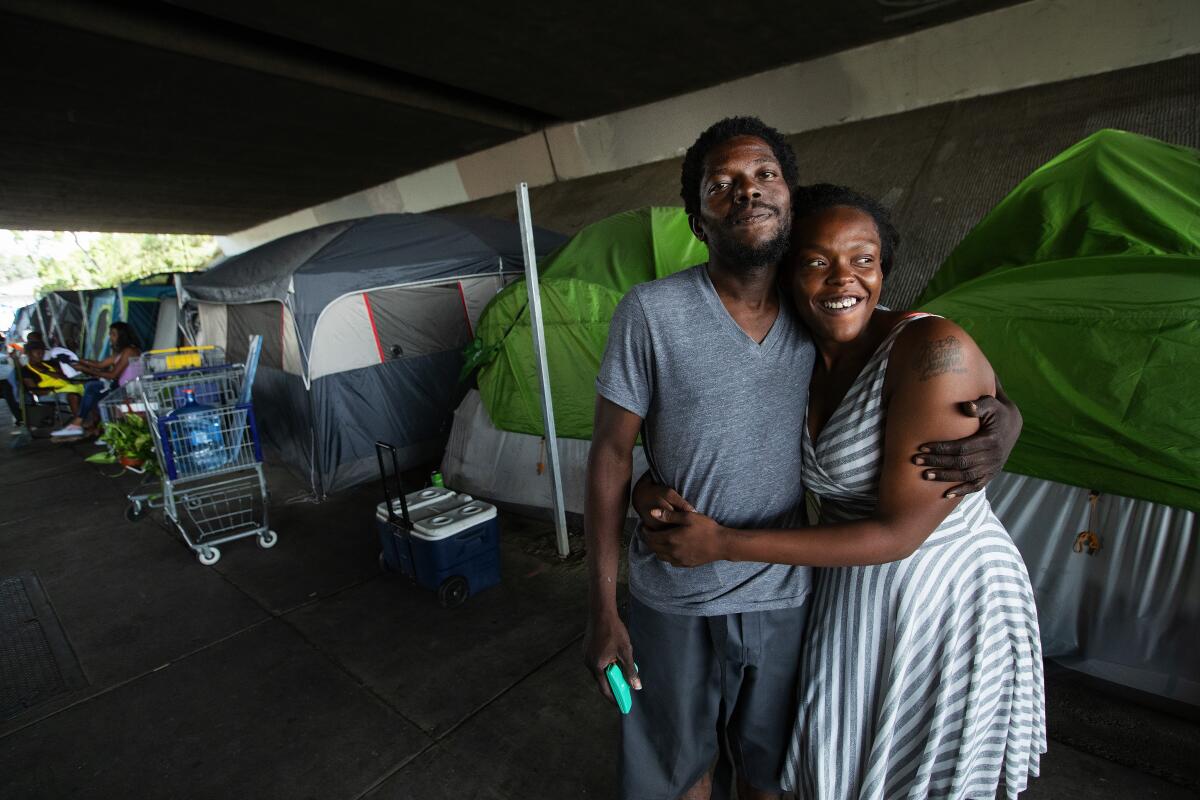 Michelle Vaughn, 24, and Edwin Williams, 31, live in a homeless encampment under the Ronald Reagan Freeway in Pacoima.