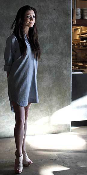 Hinoki hostess Alexandra DeMartini in the third incarnation of the shirt dress uniform. The dress is designed to hit thigh high.