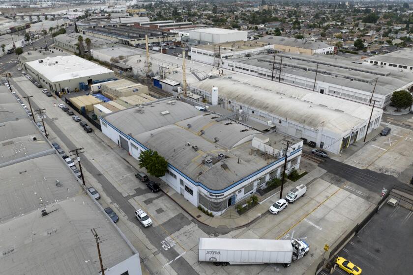 VERNON, CA - AUGUST 04: The South Coast Air Quality Management District has issued several notices of violations to three facilities that sterilize medical equipment in Southern California for elevated concentrations of ethylene oxide, an odorless, colorless gas known to cause cancer. The facilities include Sterigenics in Vernon (center building), Sterigenics in Ontario and Parter Sterilization Services in Carson. Photographed on Thursday, Aug. 4, 2022 in Vernon, CA. (Myung J. Chun / Los Angeles Times)