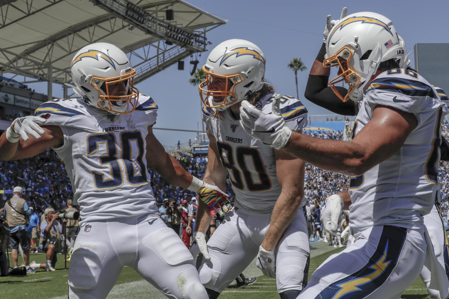 CARSON, CA, SUNDAY, SEPTEMBER 8, 2019 - Chargers running back Austin Ekeler celebrates a touchdown with teammates in the first quarter against the Colts at Dignity Health Sports Park. (Robert Gauthier/Los Angeles Times)