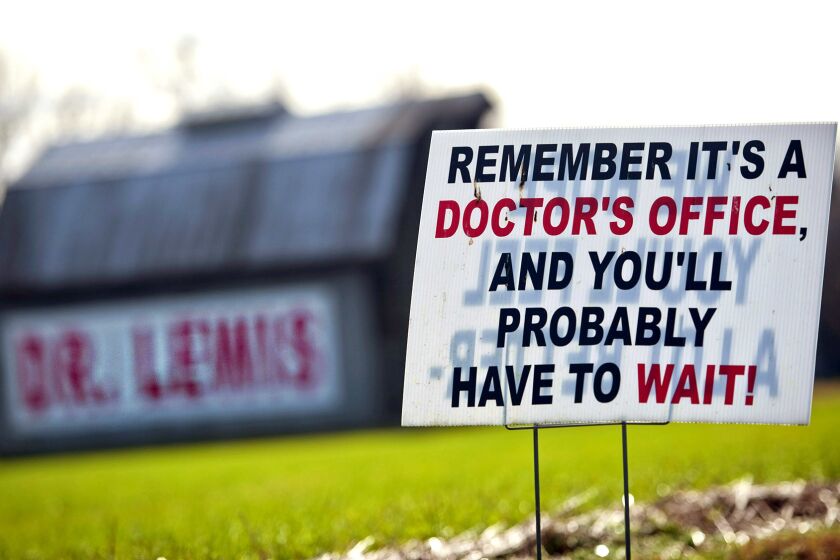 REEDVILLE, VA - DECEMBER 12: Unique signs line the drive up to Rural Doctor Emory Lewis' family practice, where he serves approximately 65 percent of patients insured by Medicare, in Reedville, Virginia, Monday, December 12, 2011. (Photo by Melina Mara/The Washington Post via Getty Images)