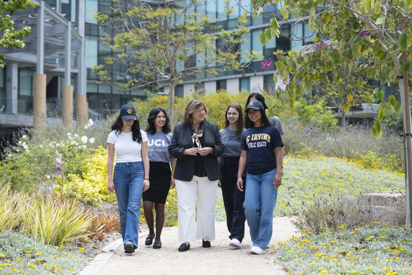 UC Irvine announced the creation of the Joe C. Wen School of Population and Public Health on Thursday. Bernadette Boden-Albala, center, is the founding dean.