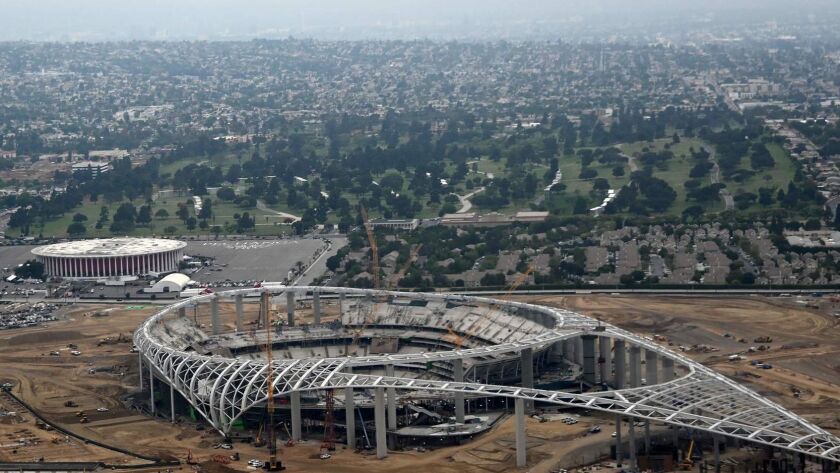 The Rams and Chargers stadium is seen under construction in Inglewood on May 9.