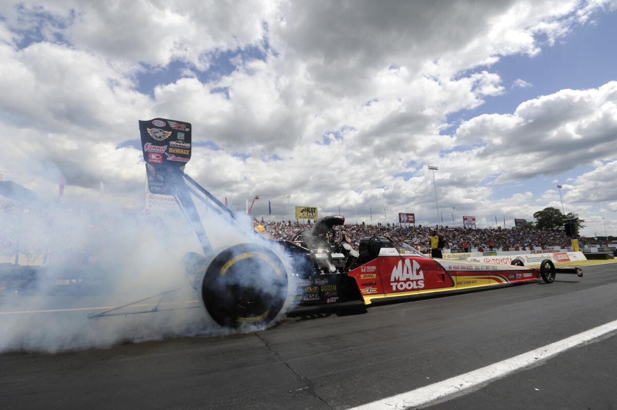 Top Fuel driver Doug Kalitta secures the No. 1 qualifying position in his Mac Tools dragster at the 45th annual Toyota NHRA Summernationals on May 31.