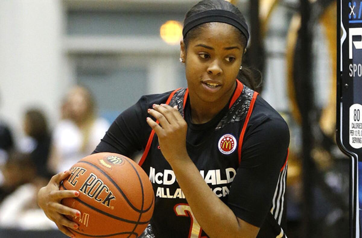 Jordin Canada takes part in the skills competition during the McDonald's All-American Jam Fest on Monday in Chicago.