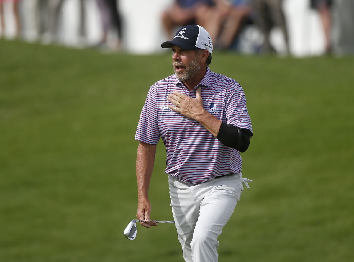 Doug Barron reacts to seeing his ball close to the pin on the 18th hole during the Hoag Classic on Saturday.