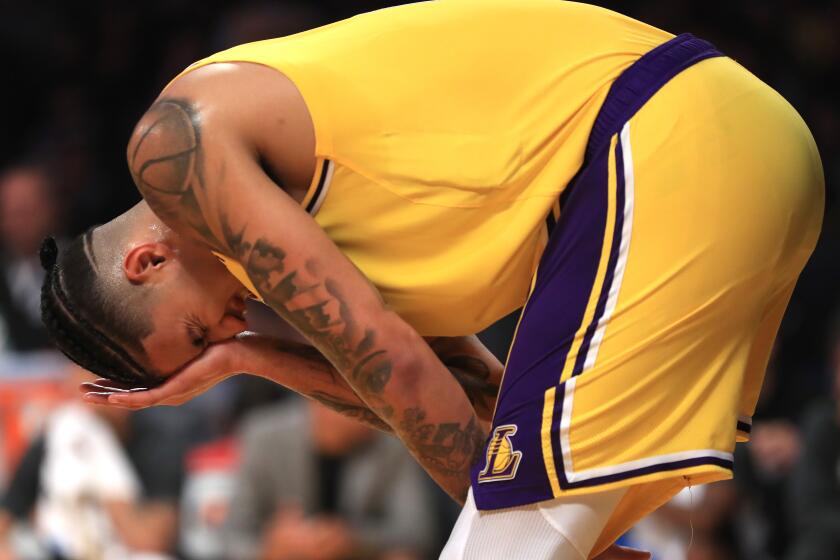 LOS ANGELES, CALIFORNIA - NOVEMBER 19: Kyle Kuzma #0 of the Los Angeles Lakers holds his eye during the first half of a game against the Oklahoma City Thunder at Staples Center on November 19, 2019 in Los Angeles, California. NOTE TO USER: User expressly acknowledges and agrees that, by downloading and/or using this photograph, user is consenting to the terms and conditions of the Getty Images License Agreement (Photo by Sean M. Haffey/Getty Images)