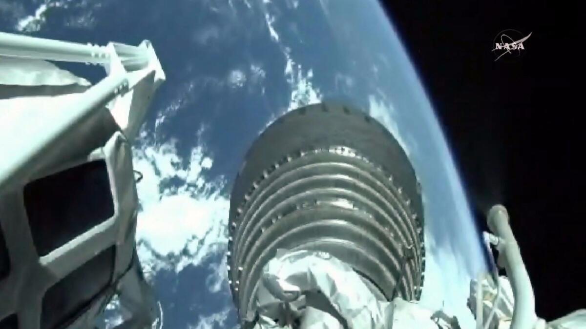 An image from NASA TV shows a view of Earth from the International Space Station on Tuesday.