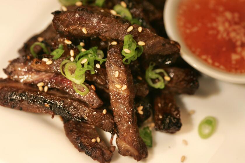 These Korean-style short ribs are a perfect appetizer when you're entertaining with little time to spare. Simply marinate the ribs the night before, then just before serving, char the beef quickly, slice and serve with a Thai dipping sauce. You'll have happy guests in almost no time.