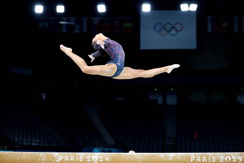 U.S. gymnast Hezly Rivera performs on the beam during podium training ahead of the 2024 Olympics 