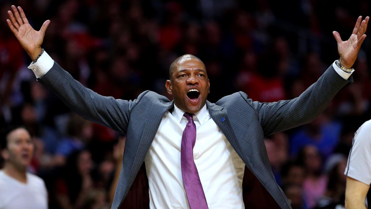 Clippers Coach Doc Rivers questions a call in the second half of the game against the Raptors.