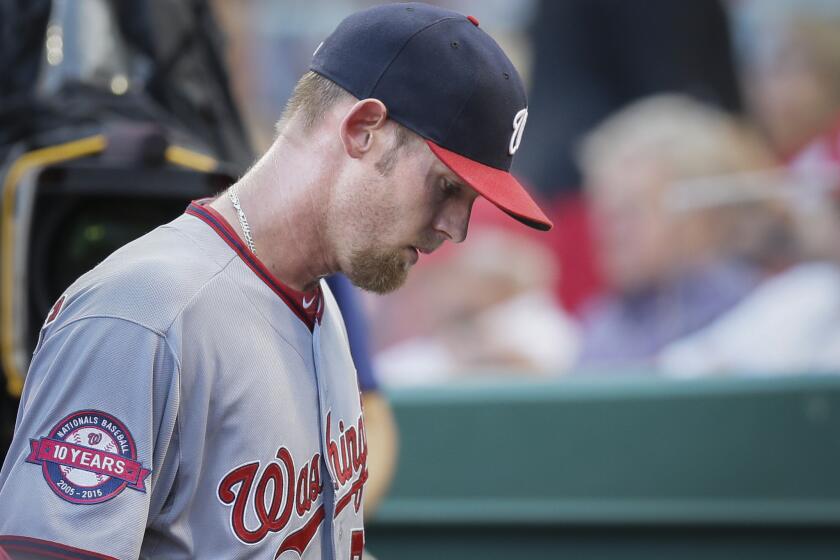 Nationals starter Stephen Strasburg exits Friday's game againt the Reds after throwing only 16 pitches.
