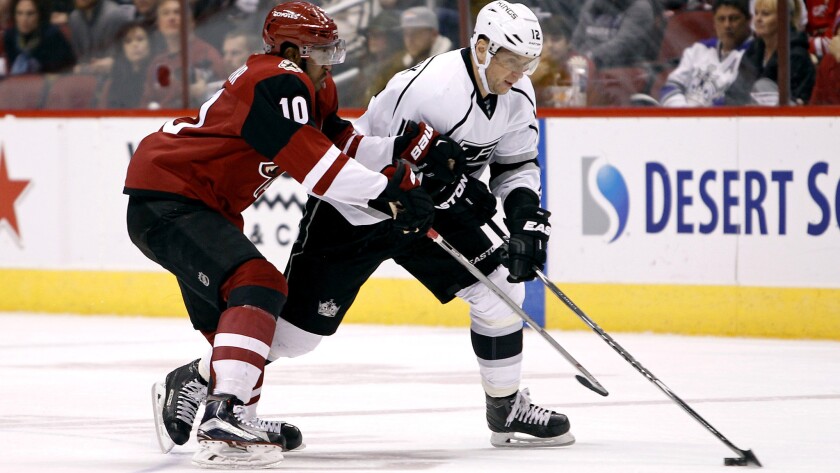 Kings right wing Marian Gaborik brings the puck up ice against Coyotes left wing Anthony Duclair during a game Dec. 26.