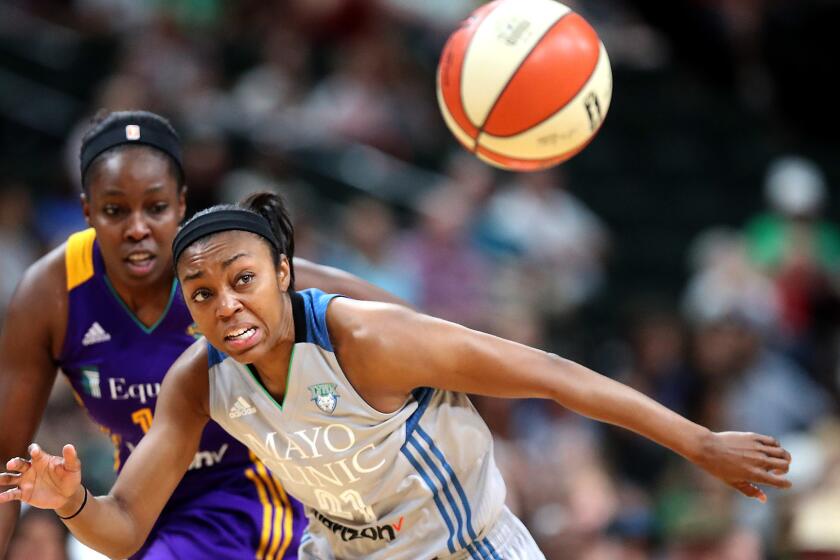 Minnesota Lynx guard Renee Montgomery, right, and Los Angeles Sparks guard Chelsea Gray battle for the ball during the second quarter at the Xcel Energy Center in St. Paul, Minn., on Thursday, July 6, 2017. (Elizabeth Flores/Minneapolis Star Tribune/TNS) ** OUTS - ELSENT, FPG, TCN - OUTS **