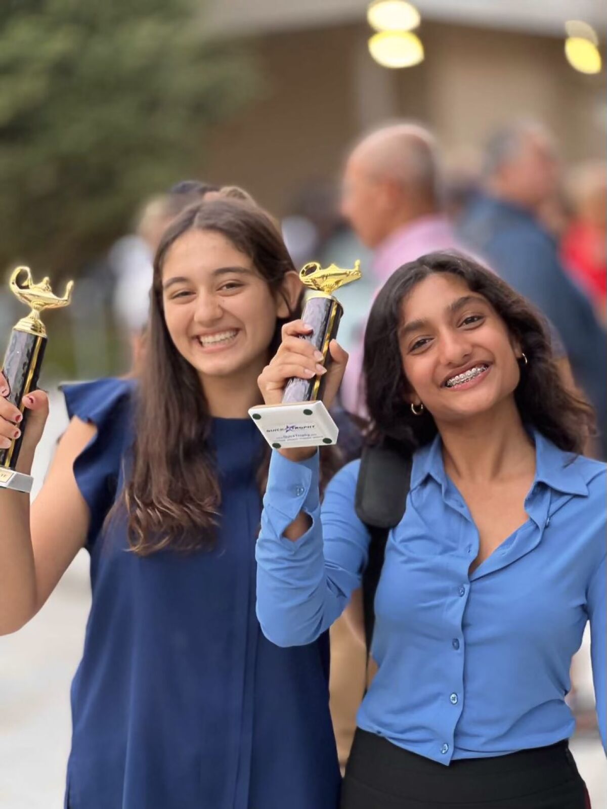 Sofia Inamdar (left) and Aria Khaitan (right) with their awards.
