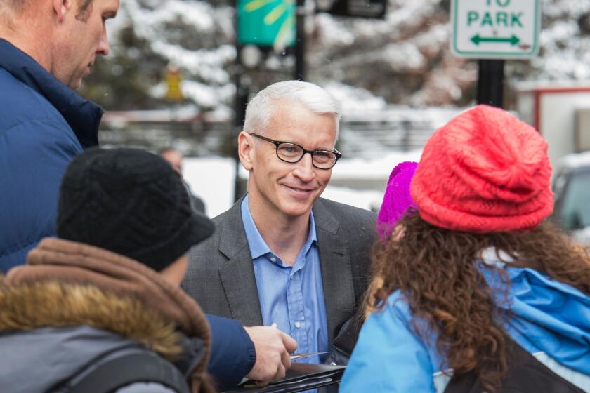 Anderson Cooper on Park City's Main Street during the Sundance Film Festival.