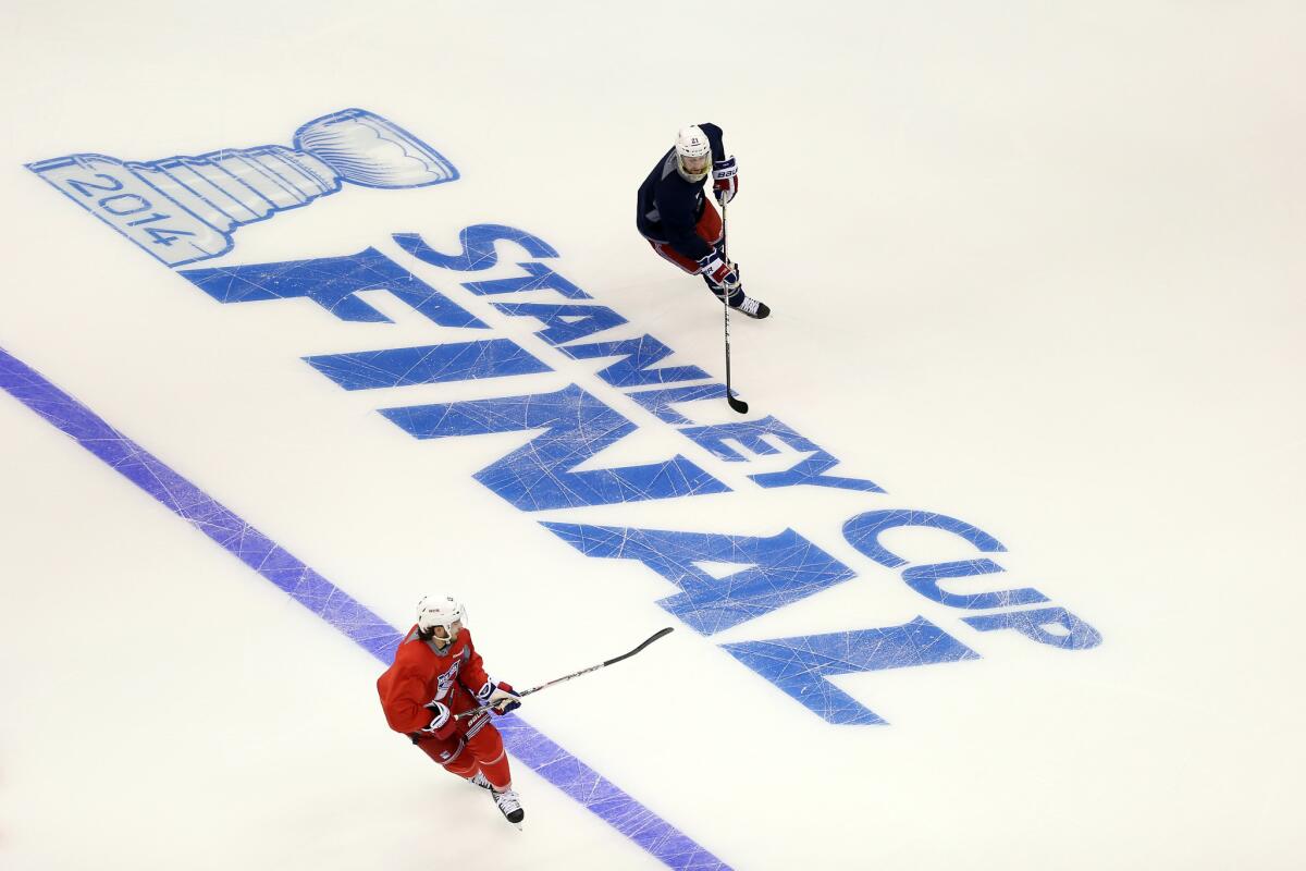 The New York Rangers skate during a practice session ahead of the 2014 NHL Stanley Cup Final at Staples Center on Tuesday. The governors of California and New York are wagering rice cakes and hockey pucks on the match.
