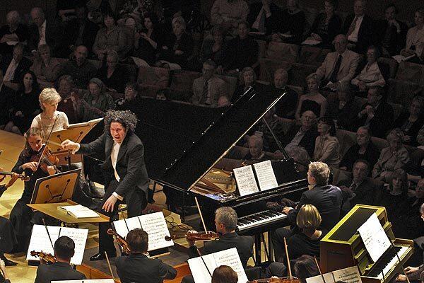 Gustavo Dudamel conducts Olivier Messiaen's "Turangalila" on Thursday at Walt Disney Concert Hall, featuring soloist Jean-Yves Thibaudet at the piano and Cynthia Millar on the ondes martenot.