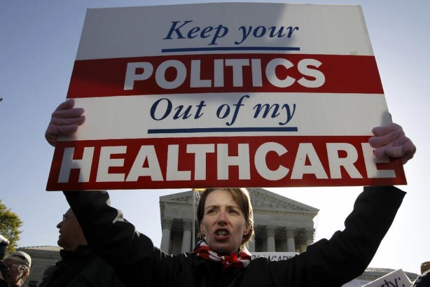 Demonstrator in front of the Supreme Court building as it pondered the fate of the Affordable Care Act. Are Americans ready to think about what's really at stake in their healthcare system?